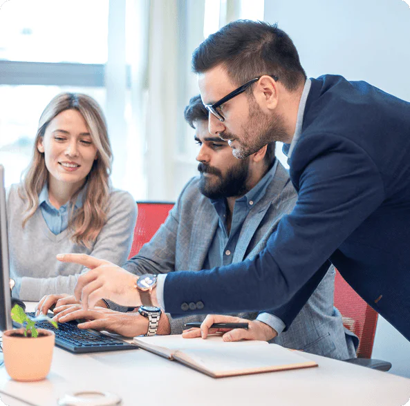 Group discusses information on a computer