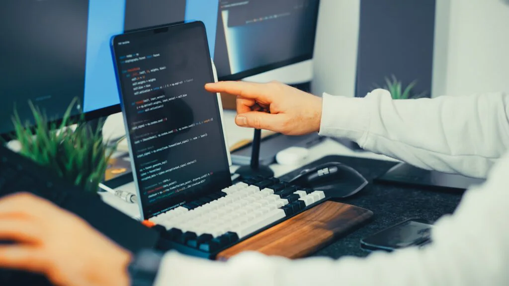 Developer Reviewing Code Used for Automated Compliance Checks